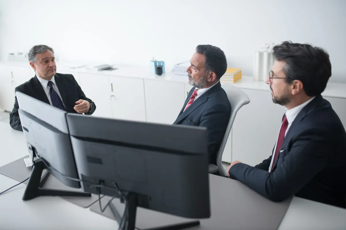 Company executives meeting with their outsourced CFO